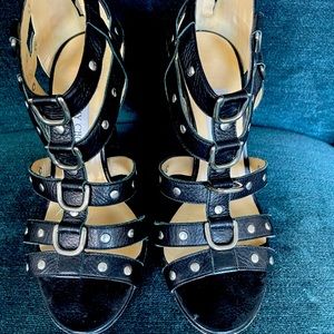 Jimmy Choo black leather pump with silver metal details